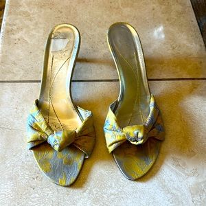 Pretty brocade yellow and silver vintage Kate spade mules from the 2005 coll
